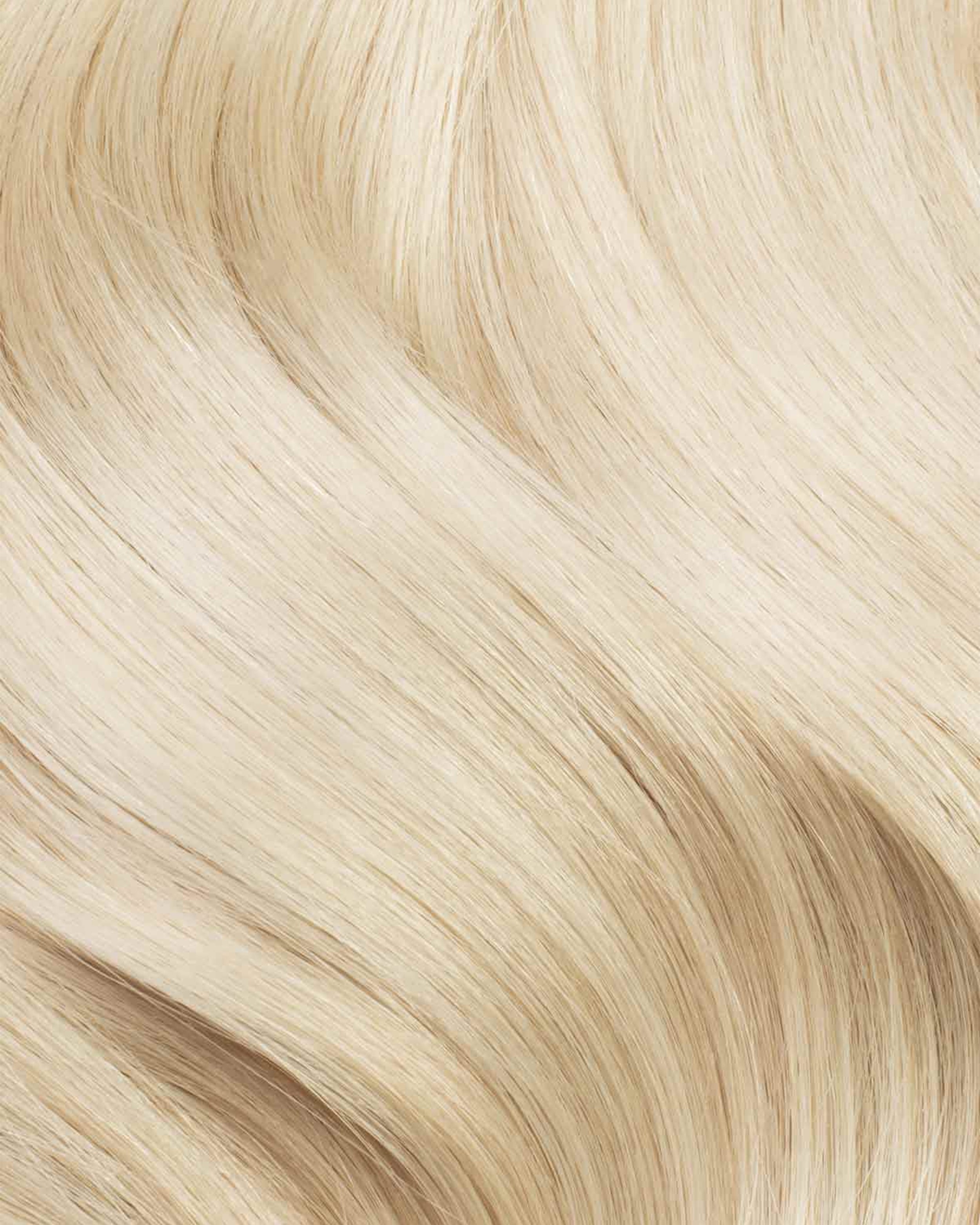 Close-up of blonde hair with a wavy texture